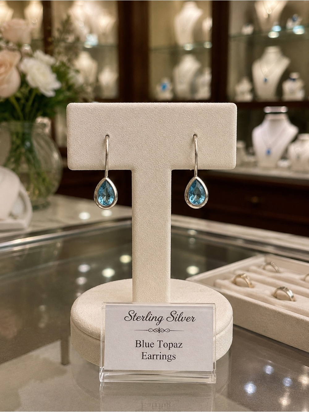 SS blue topaz earrings